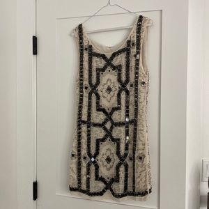 Beautiful free people beaded mini dress with v back!